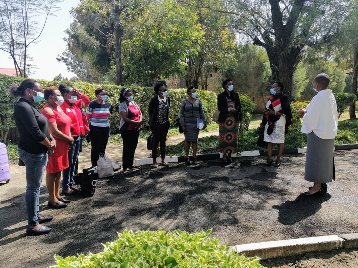 IVVN outreach team standing outside Naivasha Girls Secondary School before the workshop