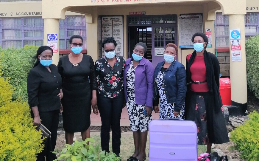 IVVN outreach team outside St Loise school