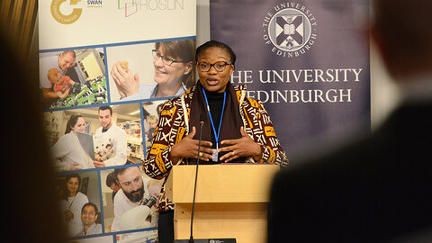 Michèle Mbo'o-Tchouawou, deputy director of programmes at African Women in Agricultural Research and Development (AWARD) speaking at the Scottish Parliament. Photograph of Michèle Mbo'o-Tchouawou speaking