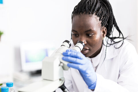Image credit: valentinrussanov/Getty Images Scientist looking through a microscope